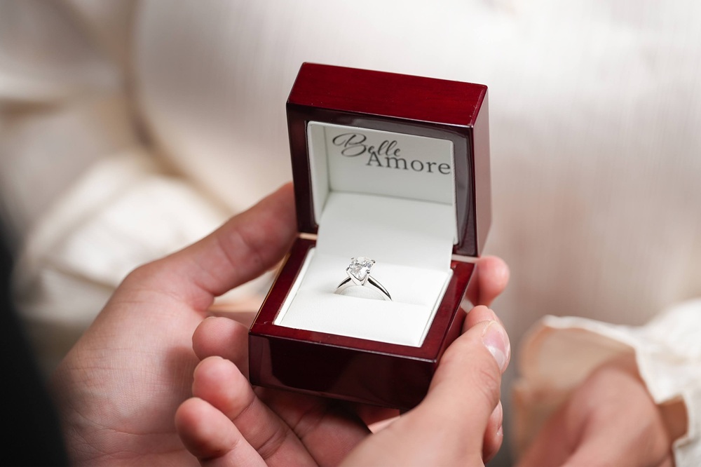 oval solitaire lab grown diamond ring in a safe jewelry storage box