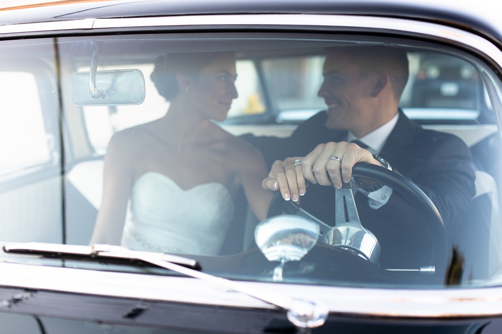 wedding rings on couple